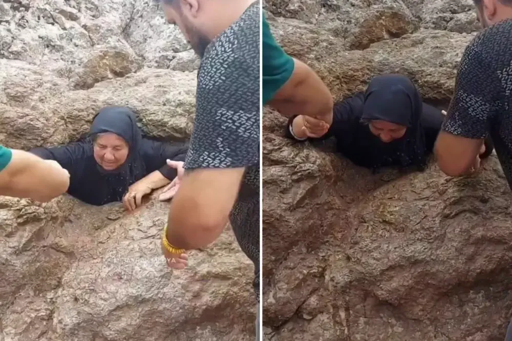 Alevi vatandaşların geçmek için sıraya girdiği delik